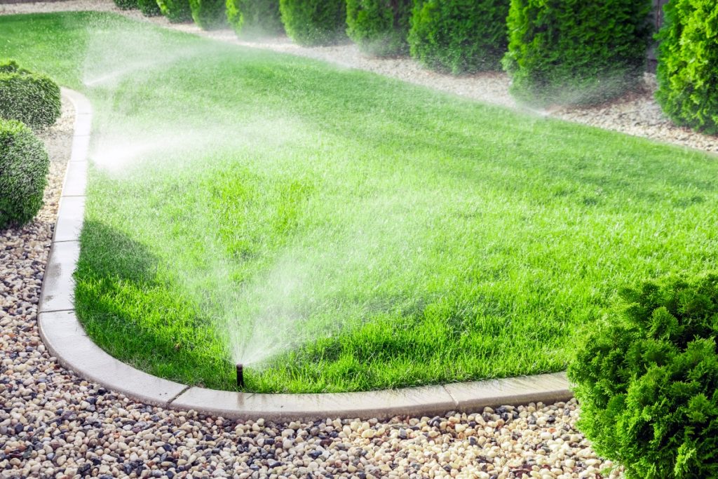 lawn sprinkler system using water